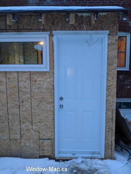 Back door. Solid core door. Embossed panels